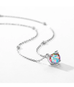 Close-up of S925 sterling silver necklace with a faceted rainbow zircon pendant in four-prong setting