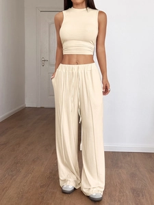 Set Y2K beige da donna con crop top senza maniche e pantaloni a vita alta a gamba larga
