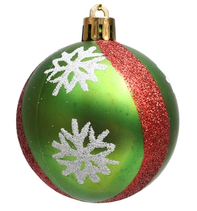 Detail of green Christmas ball with white glitter snowflakes and red vertical stripes