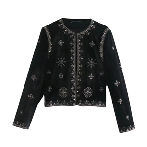 Veste élégante en velours noir avec broderie pailletée argentée motif flocon