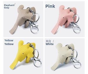 Genuine leather elephant keychains in grey, pink, yellow, and white with silver hooks