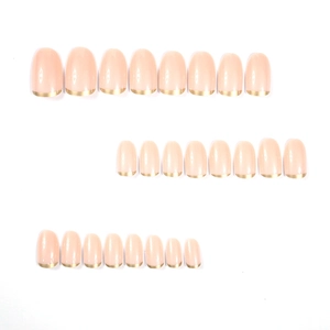Short oval press-on nails with nude pink base and elegant gold French tips, 24 pieces