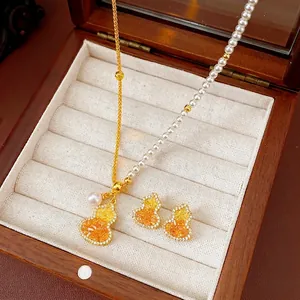 Parure de bijoux Wu Lou plaquée or 18 carats avec perles et cristaux jaunes élégants