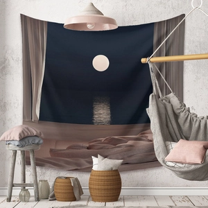 Bohemian wall tapestry featuring moonlight sea landscape in deep blue and pink tones