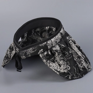 Detail of Chinese style sun visor with abstract print and adjustable back strap