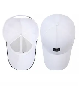 Detail view of white baseball cap with black label and FEWK printed inner lining