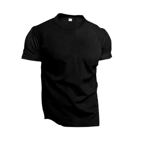 Detailed close-up of breathable black waffle knit fabric on men's slim fit sports T-shirt