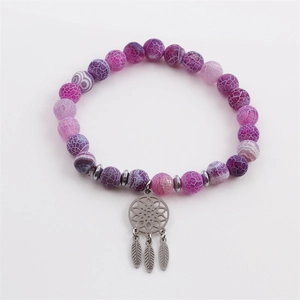 Weathered stone bead bracelet with stainless steel dreamcatcher charm on white background