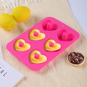 Pink heart-shaped 6-cavity silicone donut mold for baking delicious cakes and cookies