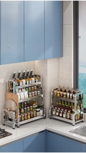 Macro detail of multi-tier stainless steel kitchen rack with knife slots and side hooks