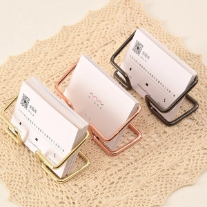 Minimalist metal business card holders in gold, rose gold, and gunmetal finishes