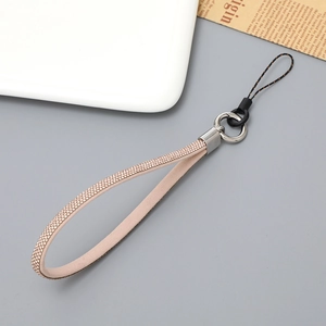 Detail of pink leather phone strap with sparkling rhinestones and silver metal ring