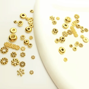 Antique gold snowflake spacers and assorted alloy flower beads for DIY jewelry making