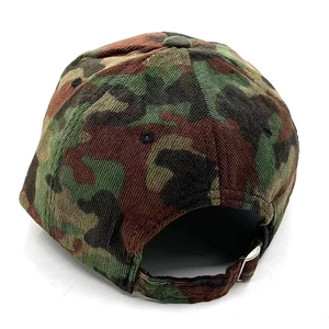 Detail view of the camouflage corduroy baseball cap with an adjustable metal buckle