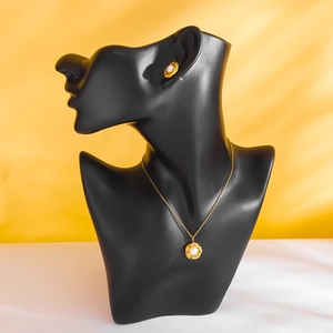 Vintage gold twist necklace and earring set with pearls and colorful zircons on black bust