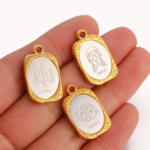 Golden framed rectangular zodiac pendants featuring Libra Virgo and Pisces engravings