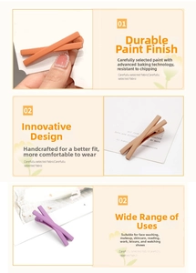 Detail of matte X-shaped hair clips in orange, beige and purple with durable paint finish