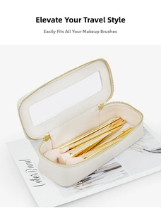Close-up of cream PU cosmetic bag with transparent window and gold metal zipper detail