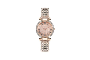 Macro shot of rose gold women watch with luxury rhinestones and Roman numerals on dial