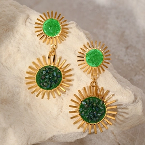 Gold sunflower drop earrings with emerald green zircon inlays and tassel details
