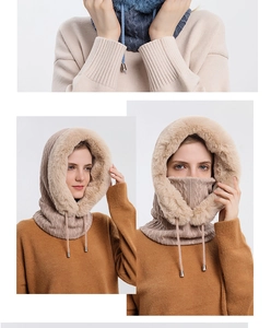 Detail view of winter knitted hooded scarf with faux fur trim and adjustable drawstrings