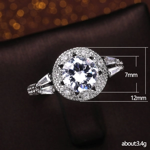 Classic silver diamond ring with 7mm round cubic zirconia on luxury leather display