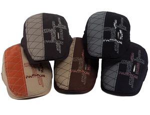 Detail of vintage patchwork ivy caps featuring letter embroidery and quilted patterns