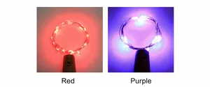 Detail view of red and purple LED wine bottle cork string lights for festive decoration