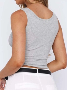 Back view of a slim fit grey ribbed tank top showing fabric texture and athletic cut