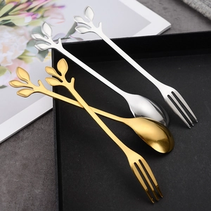 Leaf-shaped stainless steel dessert spoons and forks set in gold and silver finish