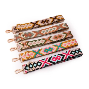 Five bohemian style woven shoulder straps with geometric patterns and metal buckles
