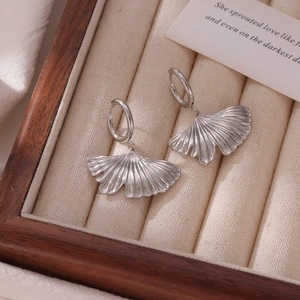 Exquisite silver ginkgo leaf dangle earrings displayed in a premium jewelry gift box