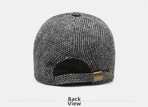 Back view of grey tweed baseball cap showing the adjustable bronze metal buckle strap