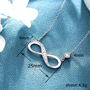 Silver infinity necklace with inlaid diamonds and a single diamond on the chain link