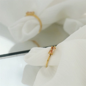 Detailed macro shot of 18K gold plated ring featuring a champagne rectangular gem