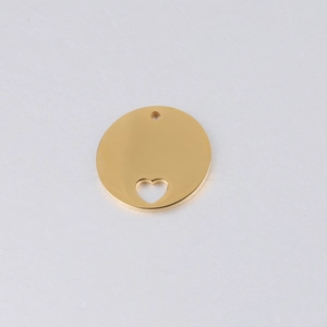Close-up of golden hollow heart stainless steel pendant with crown edge and mirror finish