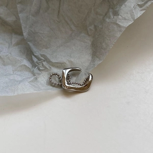 Minimalist S925 sterling silver irregular ear cuff with bead chain on white paper