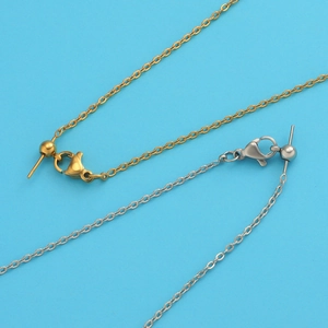 Detailed view of gold and silver stainless steel bead chains with adjustable ball slides