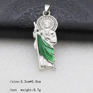 Detailed view of Saint Jude pendant with green enamel and crystal halo, 5.3cm x 2.0cm size