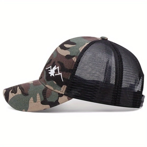 Detail of mountain embroidery on camouflage mesh baseball cap with breathable backing
