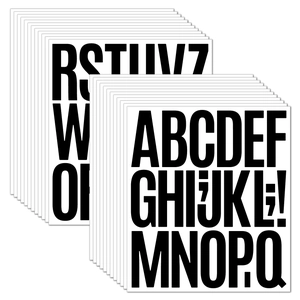 Macro detail of 3-inch black and white capital letter stickers for DIY mailbox decoration