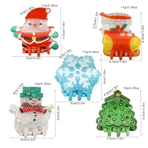 Christmas hair clips set with Santa, snowflake and tree motifs in glitter finish