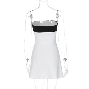 Close-up of the black and white contrast color block on the strapless mini bodycon dress