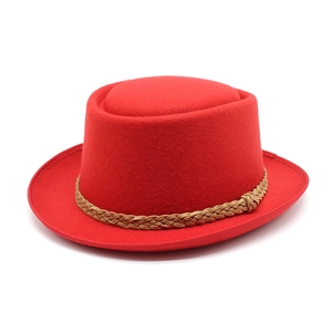 Classic red wool fedora with brown braided rope band shown from a 45-degree angle