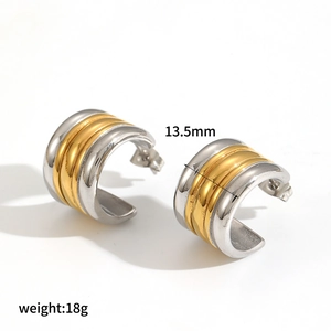 Two-tone gold and silver C-shaped stainless steel earrings with a width of 13.5mm
