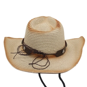 Detail view of woven straw fedora hat featuring leather band and metallic studs
