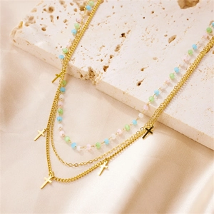 Three-layer stainless steel necklace featuring gold crosses and pastel macaron beads