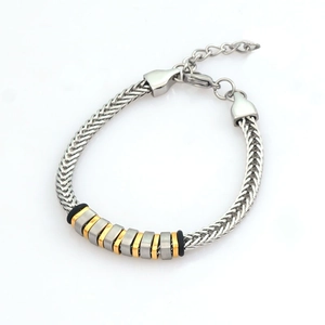 Men's magnetic therapy bracelet with silver woven chain and gold magnetic inserts