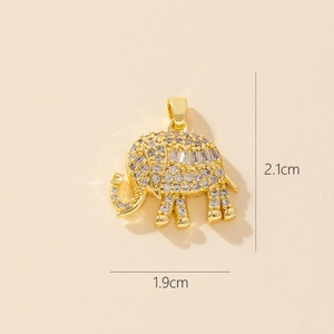 Detailed view of a gold elephant pendant with zircons showing 2.1cm height and 1.9cm width