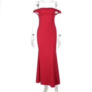 Detailed view of red off-shoulder mermaid evening gown on a mannequin with fish-tail hem